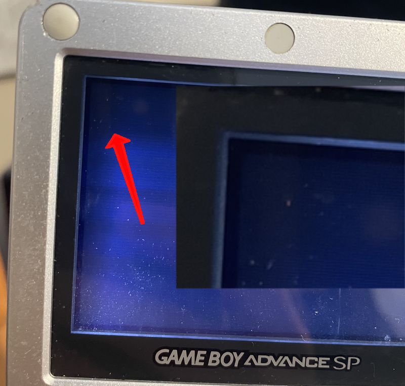 A picture of my rom running on the gameboy advance, the quality is low, the gameboy advance is making a plaintive gesture